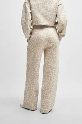 NAOMI x BOSS tracksuit bottoms with leopard print